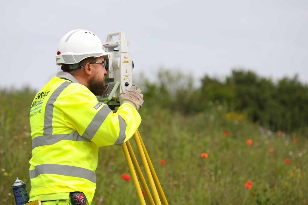 Civil Engineer using Leica Measuring Equipment for motorway expansion project