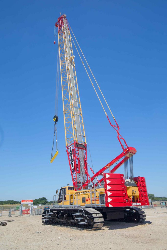 Construction-Plant-Equipment-Liebherr-Crane-lifting-steel-girder-in-place