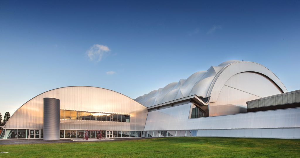 Oriam Sports Performance Centre exterior architecture by James Thompson - Scottish Design Awards Architecture Grand Prix winner showcasing curved roof design and innovative sports facility architecture